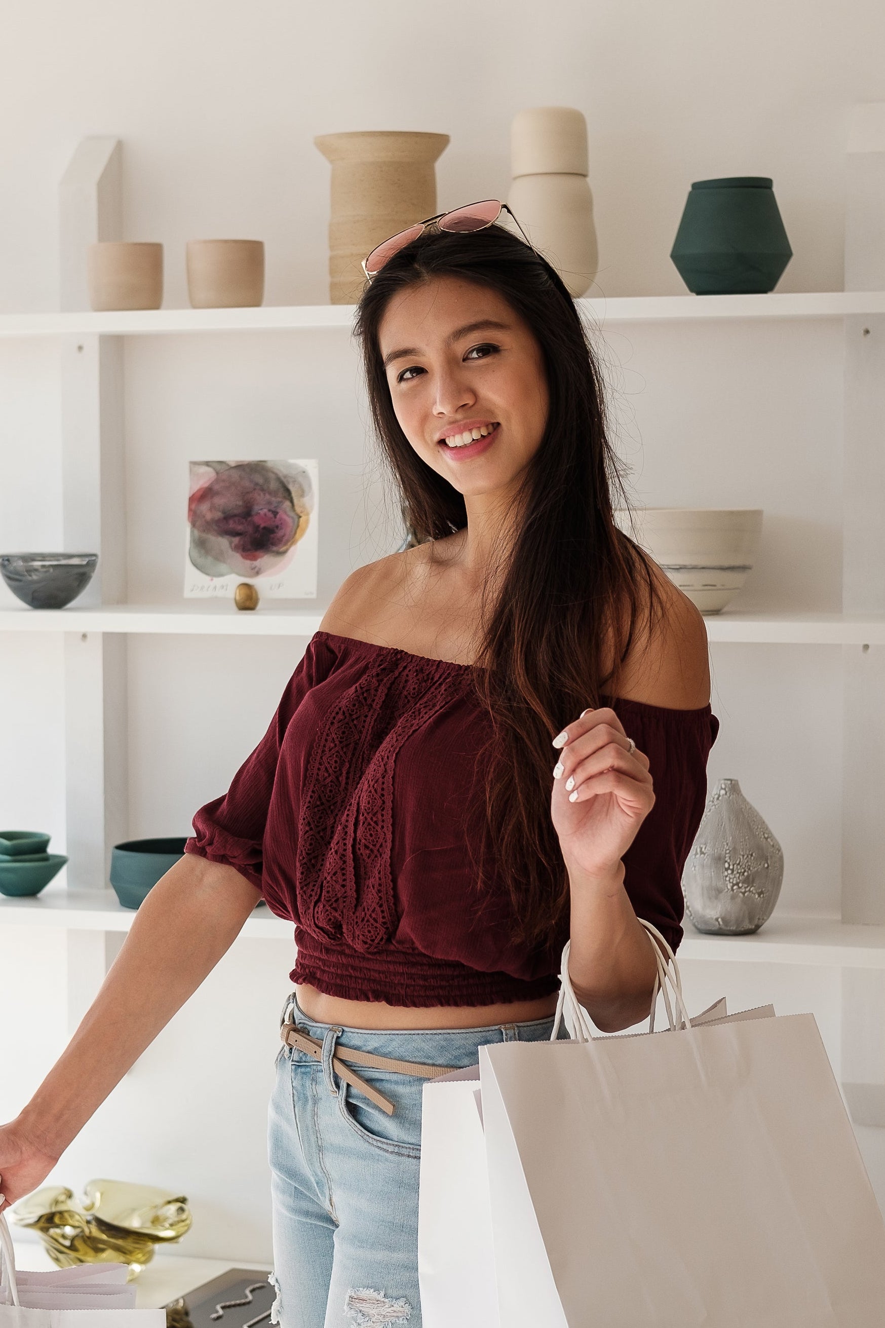 files/happy-customer-smiles-and-holds-white-shopping-bags.jpg